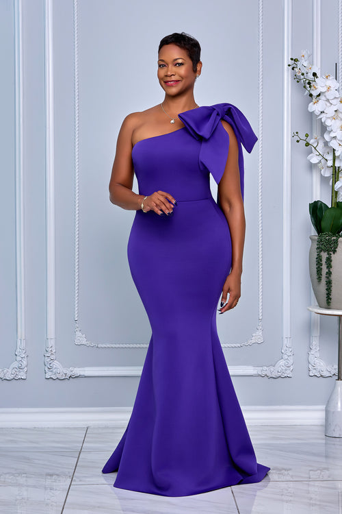 ONE SHOULDER NECKLINE STATEMENT BOW MERMAID MAXI DRESS