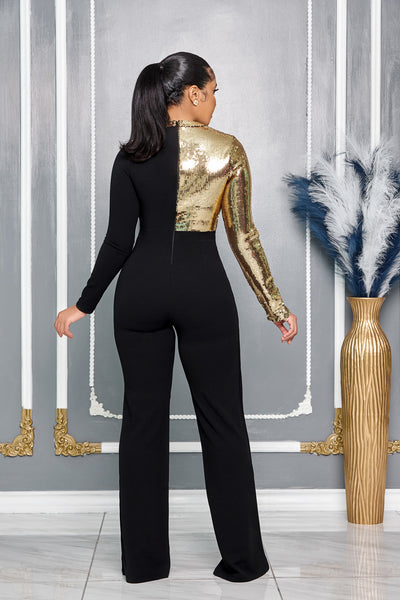 GOLD SEQUIN SLEEVE CUTOUT DETAIL CAPE BOTTOM JUMPSUIT (BLACK)